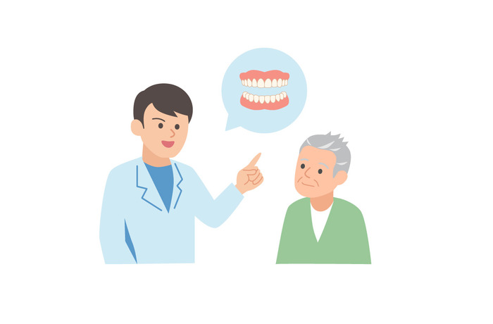 入れ歯について高齢の患者に説明する歯科医師のイラスト